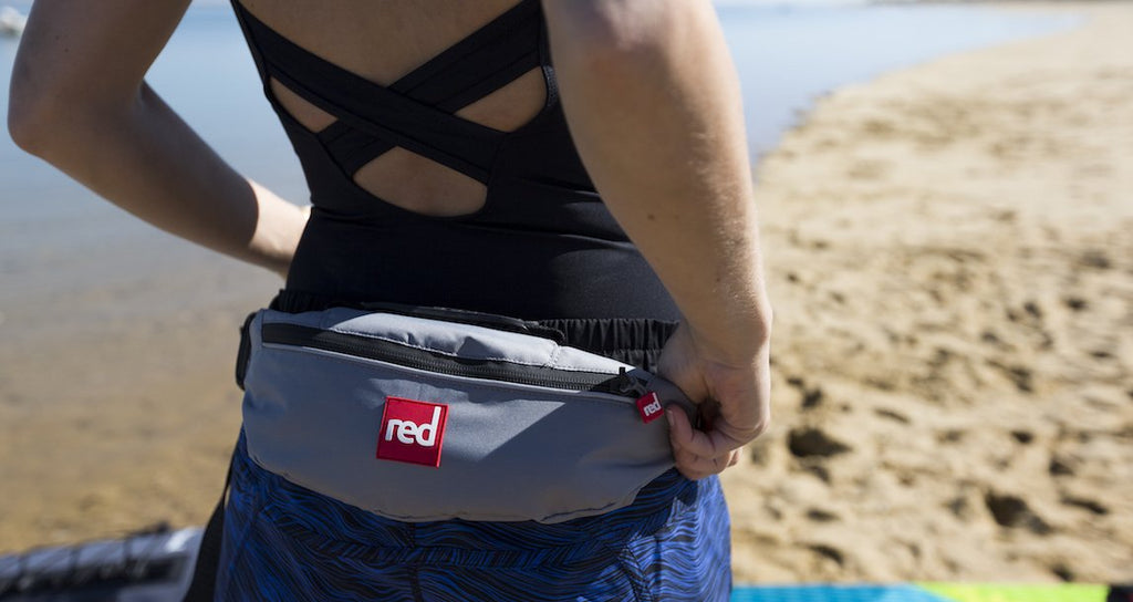 Red Equipment SUP Life Wearing A Personal Flotation Device for