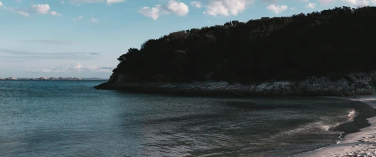 Paddleboarding in heavenly turquoise water gulf in Corsica