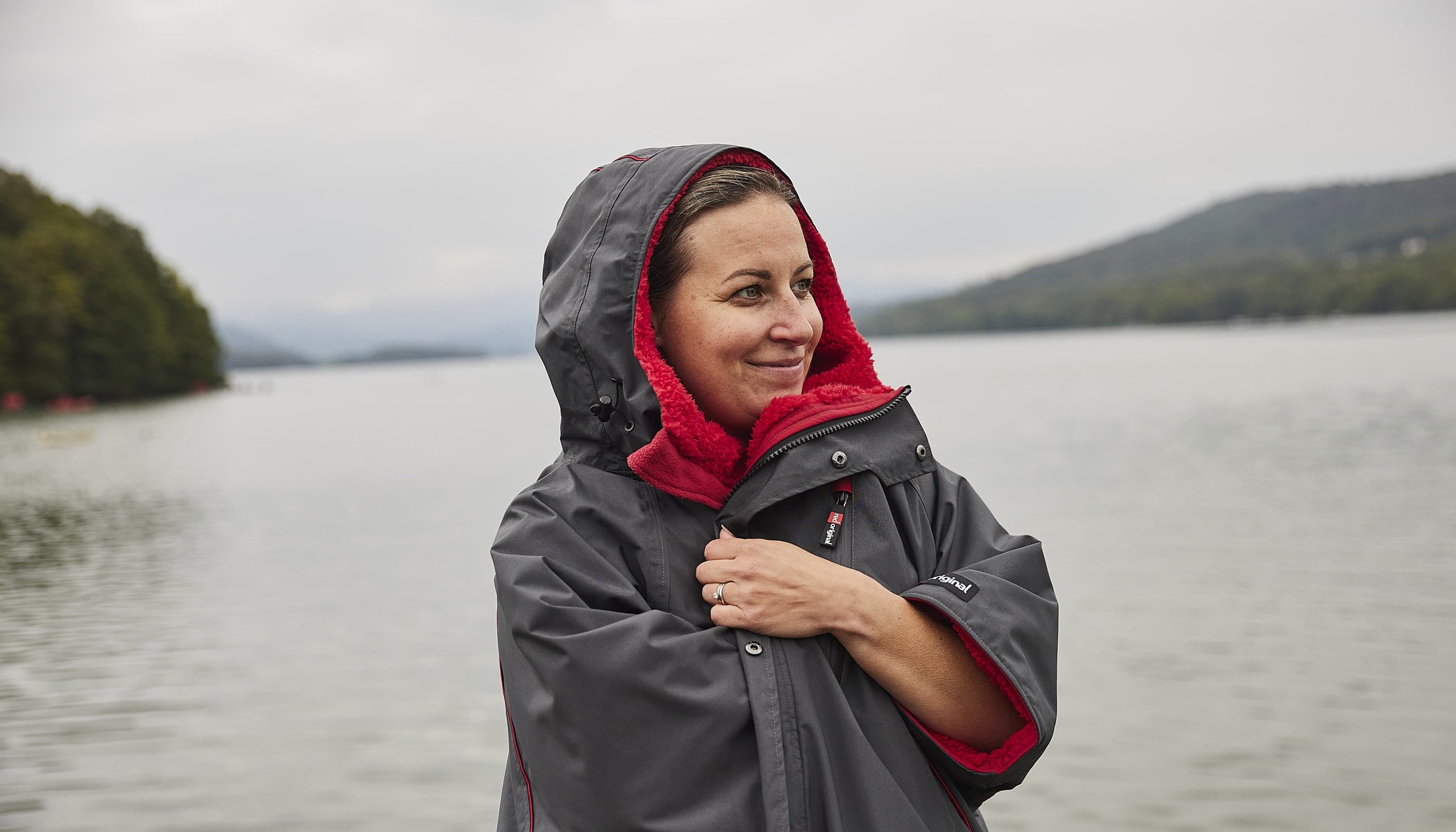 woman wearing red and black red pro change robe