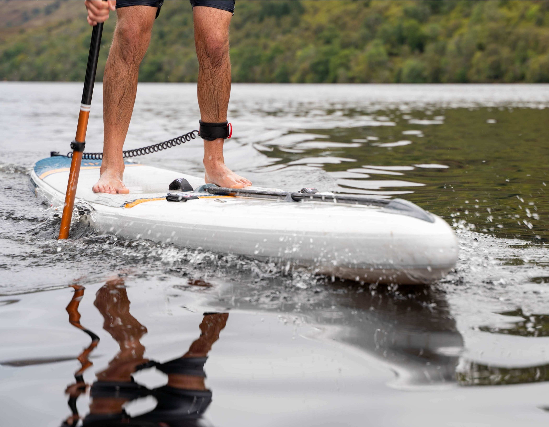 close up of rider using racing sup