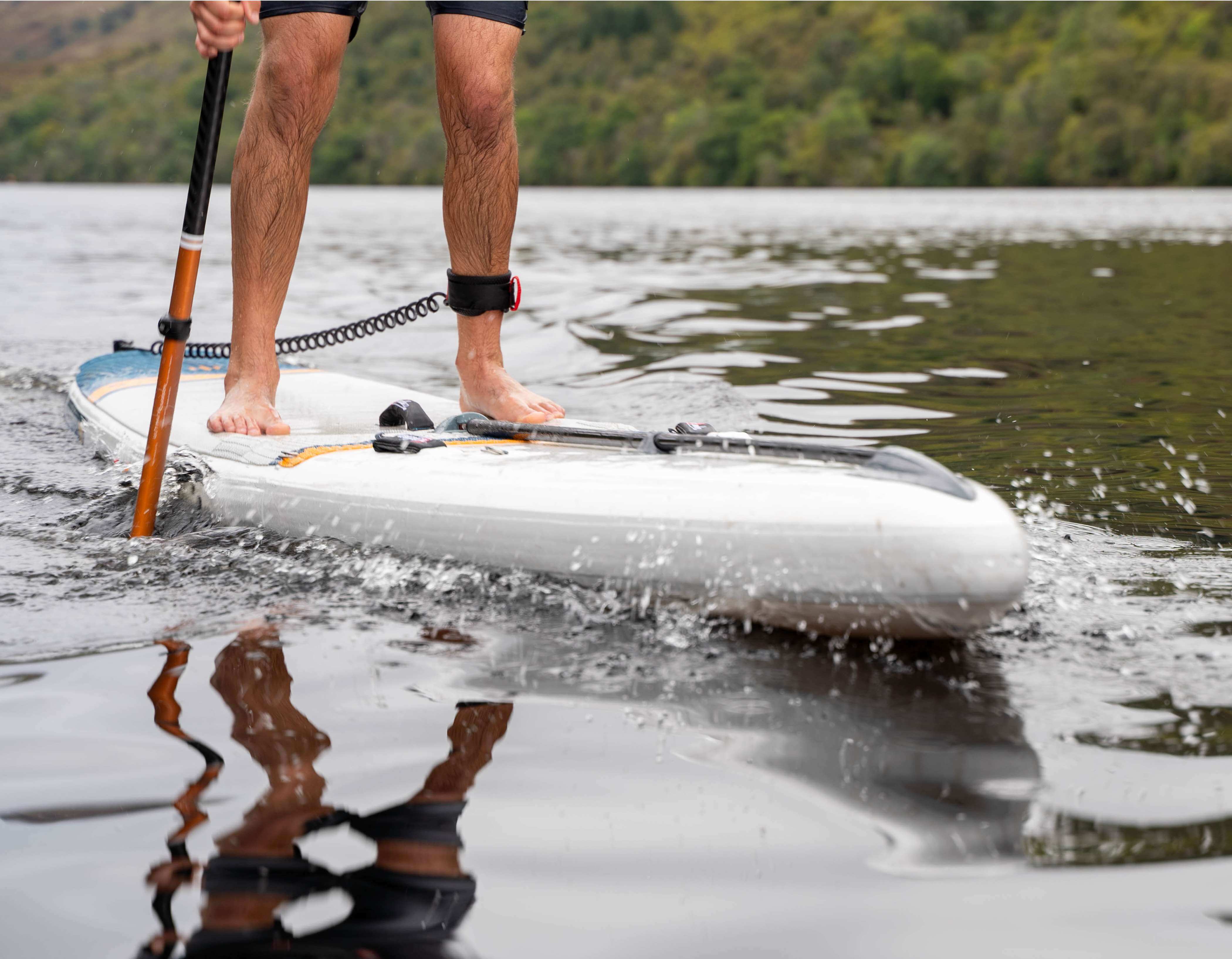close up of rider using racing sup