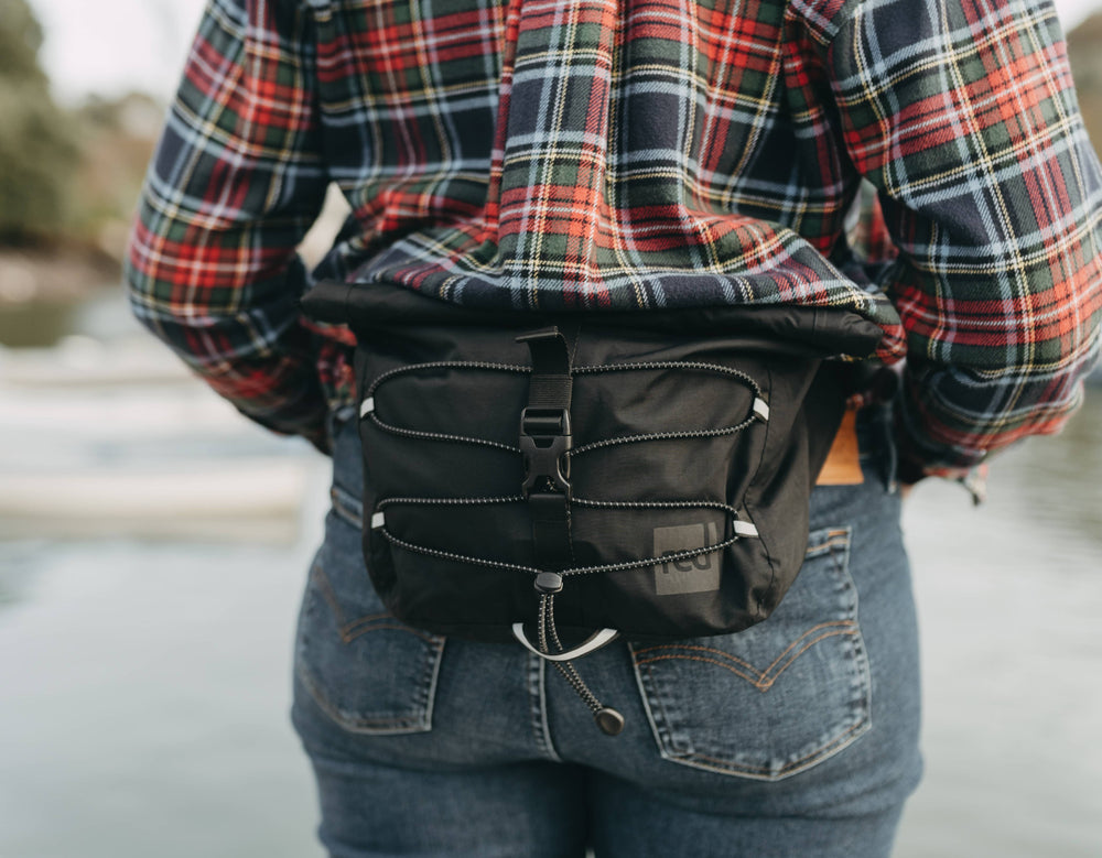 a close up of the waterproof crossbody bag being worn