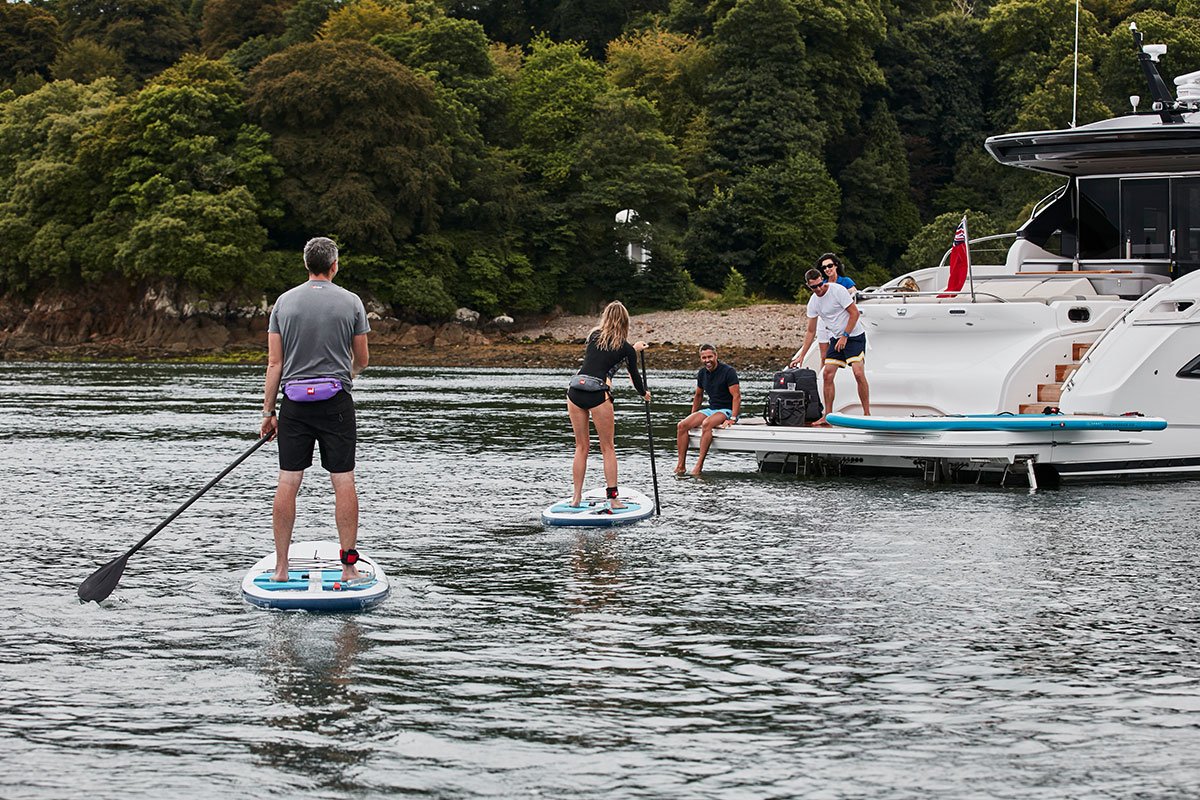 paddle boarders on the river