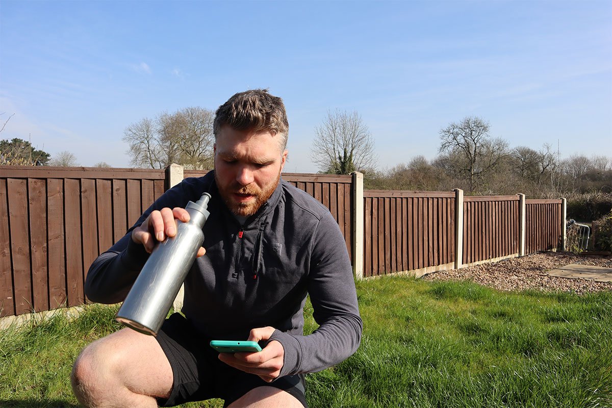 Ross Drinking From An Insulated Stainless Steel Water Bottle