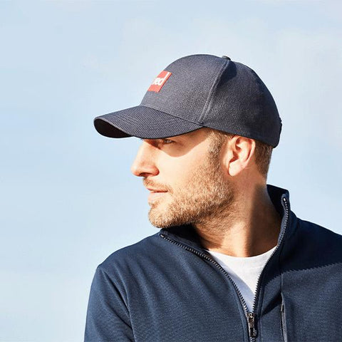 Portrait of a man wearing the Red Original Paddle Cap