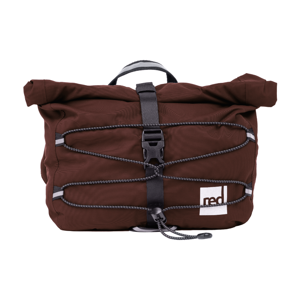 A dark brown waterproof roll-top crossbody bag with black straps and a reflective 'red' brand logo patch.